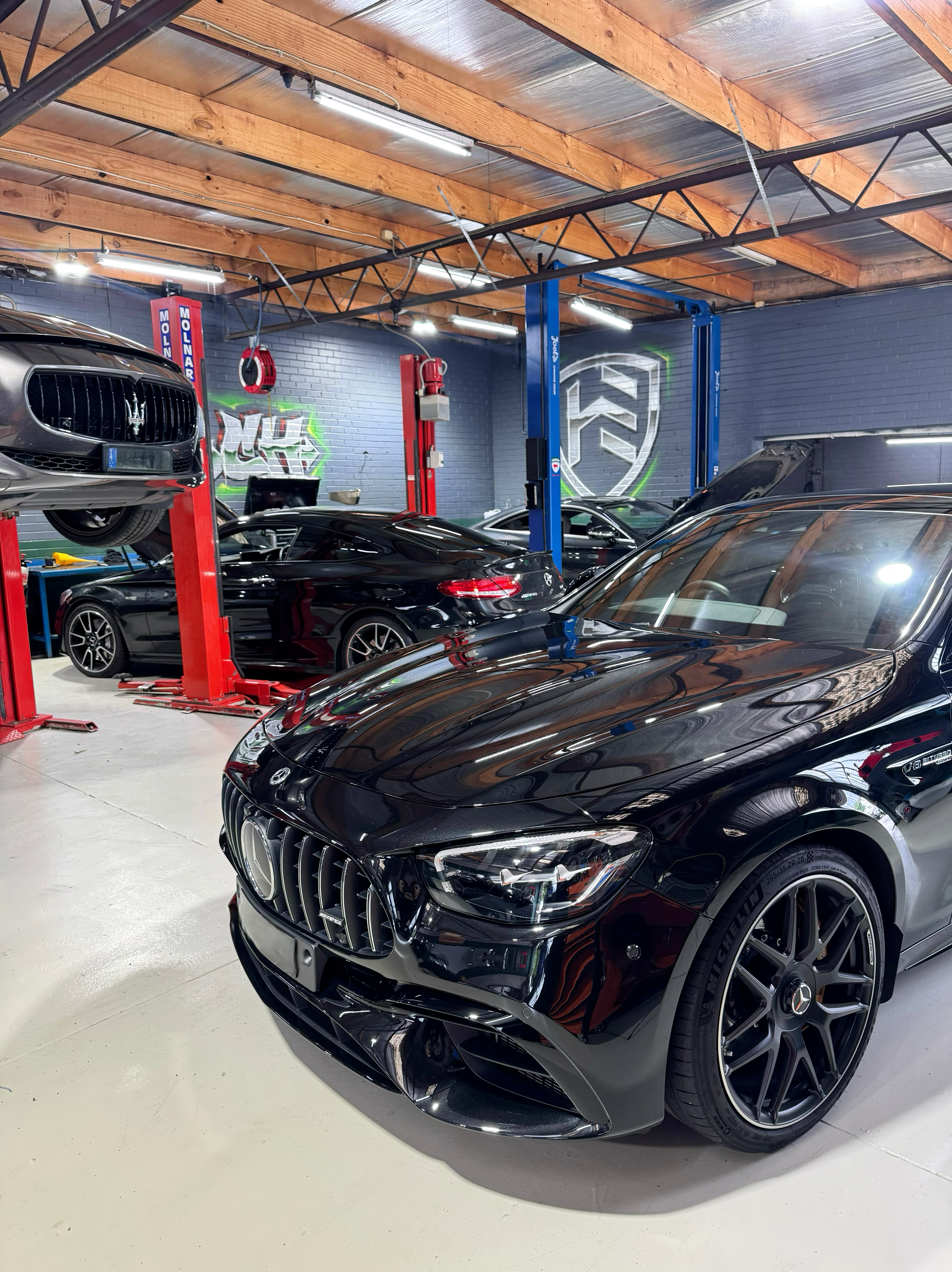 Hawthorn Eurotech workshop — Mercedes-AMG, Maserati and BMW in service bays