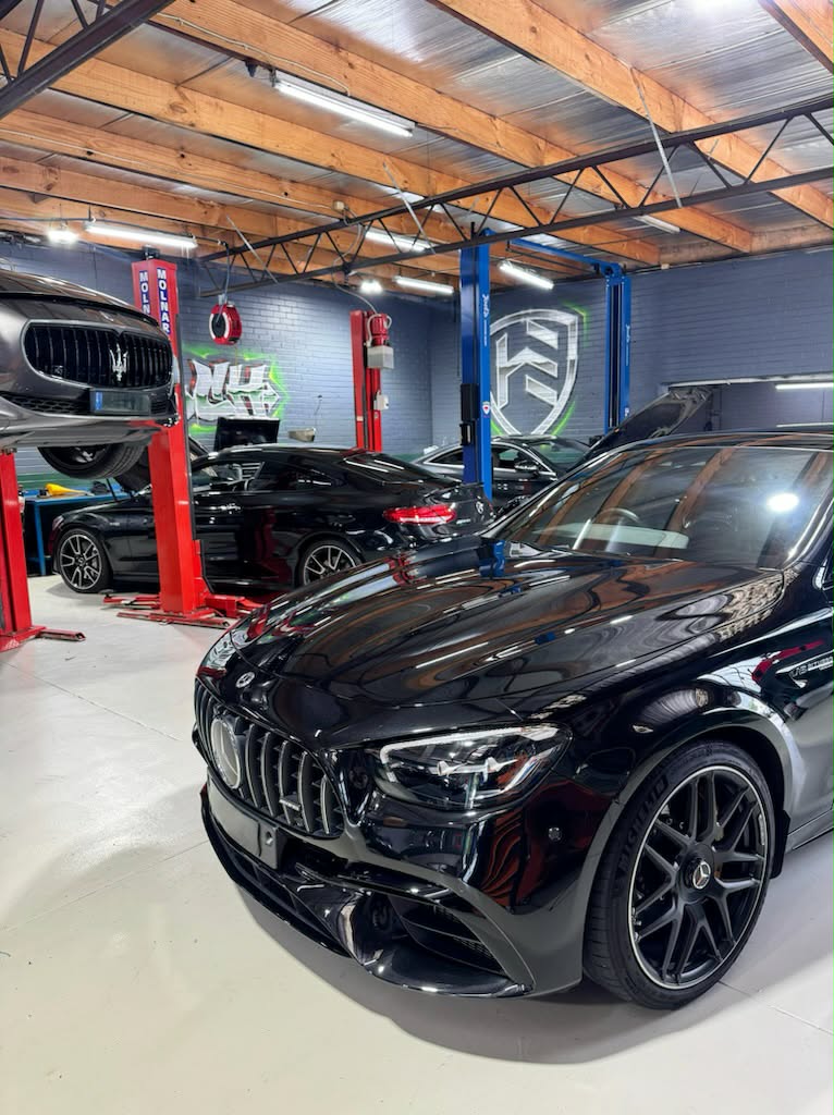 Hawthorn Eurotech workshop — Mercedes-AMG and Maserati on lifts